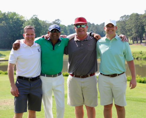 Golfers posing